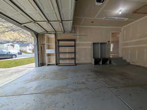 Garage featuring a garage door opener