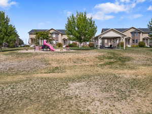 View of yard featuring a patio area and a residential view