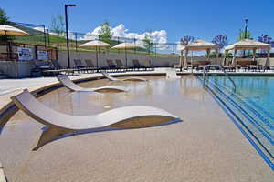 Community pool featuring a gazebo and a patio