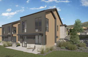 Rear view of house featuring a patio