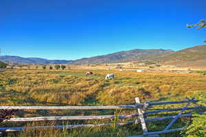 Mountain view featuring agricultural land and rural landscape