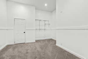 Spare room with carpet flooring and recessed lighting