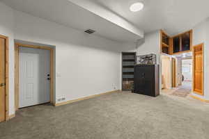 Below grade area with carpet flooring