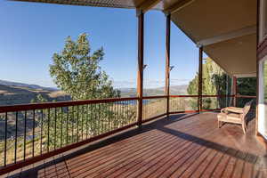 Wooden deck featuring a mountain view