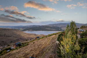 View of mountain backdrop with a large body of water