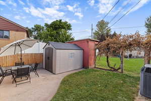 Lifetime shed to be excluded, the red shed to stay with the home. Grade vine shown