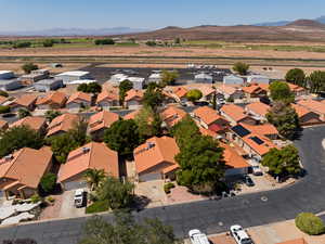 Aerial view of residential area with a mountain backdrop