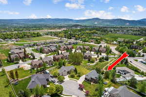 Aerial view of residential area with a mountain backdrop