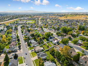 View of property location with nearby suburban area and mountains