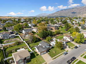 Aerial view of property's location with nearby suburban area