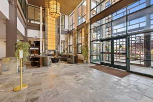 Common area with a high ceiling