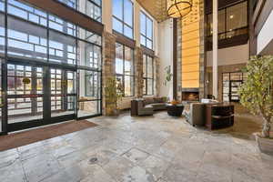 Common area with a high ceiling