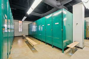 Rec room with finished concrete flooring