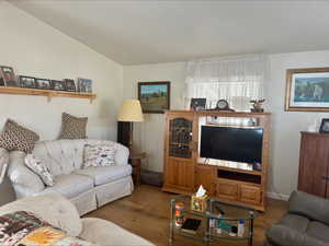 Living area featuring wood finished floors