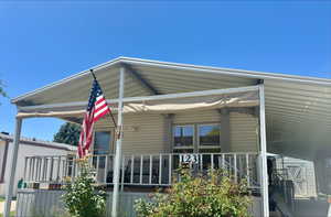 Exterior space featuring covered porch
