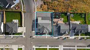 Aerial view of residential area featuring property parcel outlined