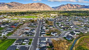 View of property location with nearby suburban area and a mountain backdrop