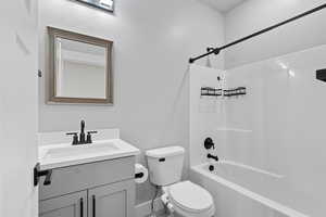 Full bathroom featuring vanity and shower / bathtub combination