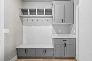 Mudroom with light wood-type flooring