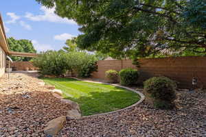 View of fenced backyard