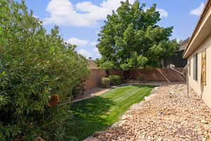 View of fenced backyard