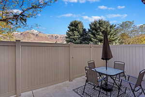View of patio featuring a mountain view and outdoor dining space
