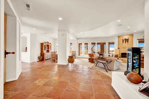 Foyer with french doors and recessed lighting