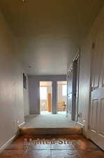 Hallway with baseboards
