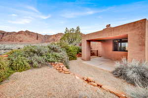 View of yard featuring a patio and a mountain view