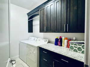 Laundry room with cabinets