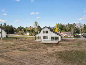 Rear view of house with board and batten siding