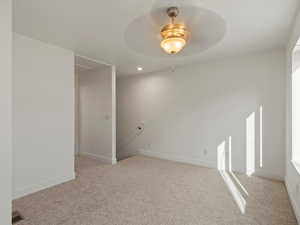 Unfurnished room with light colored carpet, recessed lighting, and ceiling fan