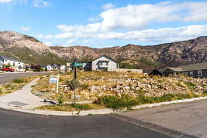 Mountain view featuring nearby suburban area