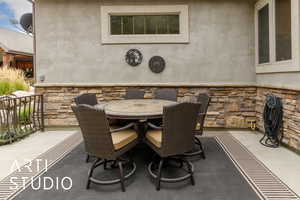 View of patio featuring outdoor dining area