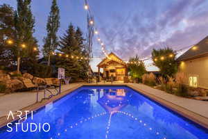 Outdoor pool featuring a patio