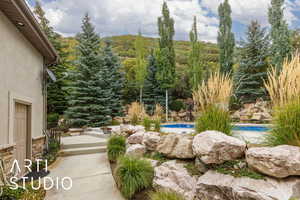 View of yard with an outdoor pool