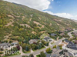 Aerial view of residential area with a mountainous background