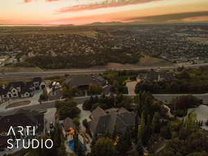 Aerial overview of property's location featuring nearby suburban area