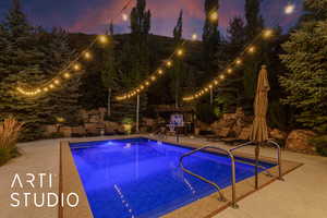 Outdoor pool featuring a patio area