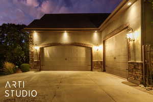 Garage featuring driveway
