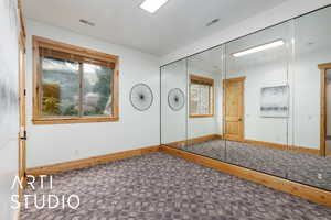 Interior space featuring baseboards