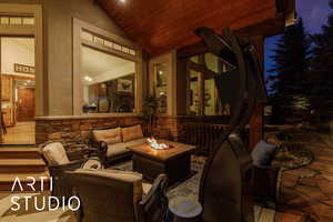 Building lobby featuring high vaulted ceiling and wooden ceiling
