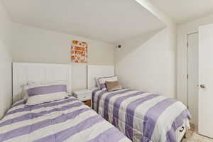 Bedroom with carpet flooring