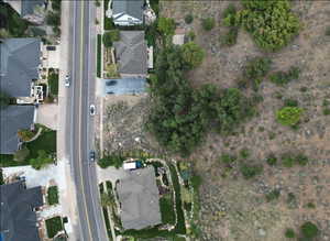 View of property location with nearby suburban area