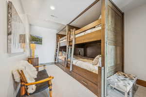 Bedroom featuring baseboards and recessed lighting