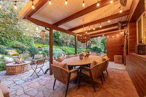 Covered Patio with Fire-pit, Ceiling Heaters, Kitchenette, Mature Landscaping and Mountain View