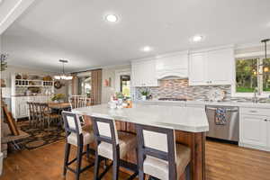 Kitchen with Quartz Countertops, Updated Cabinetry and Chef's Kitchen Appliances