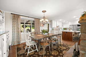 Dining Room with Double-Sided Fireplace and Views to Back Patio