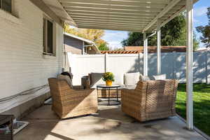 View of patio with an outdoor living space