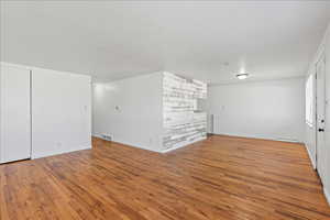 Living room view with a dining area